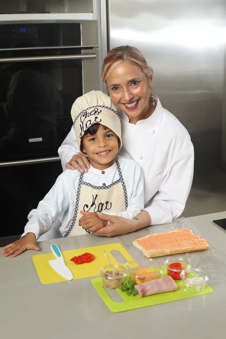 Chef Marisol and young chefs cooking recipes from the Puerto Rican children’s cookbook Juanchos 1
